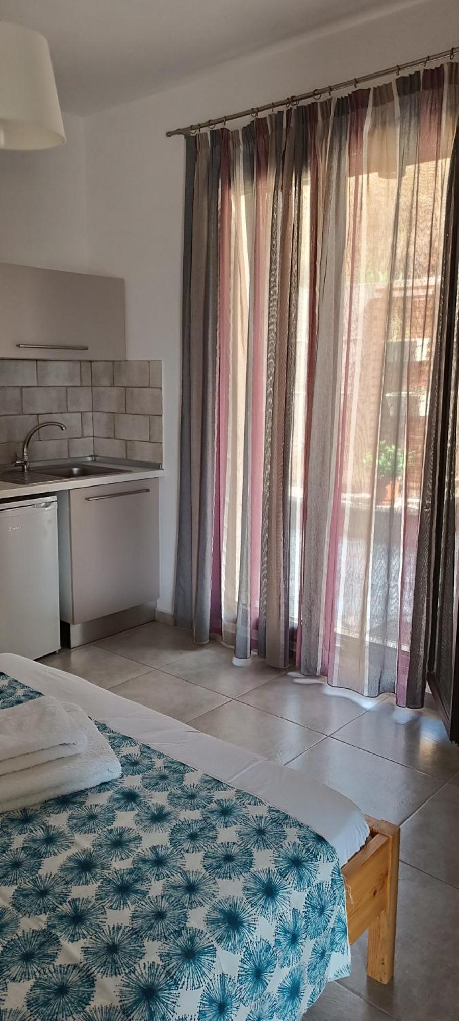 Avli Apartments Pyrgadikia Quarto foto